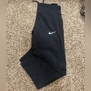 Nike woman’s Black Leggings with White Swoosh